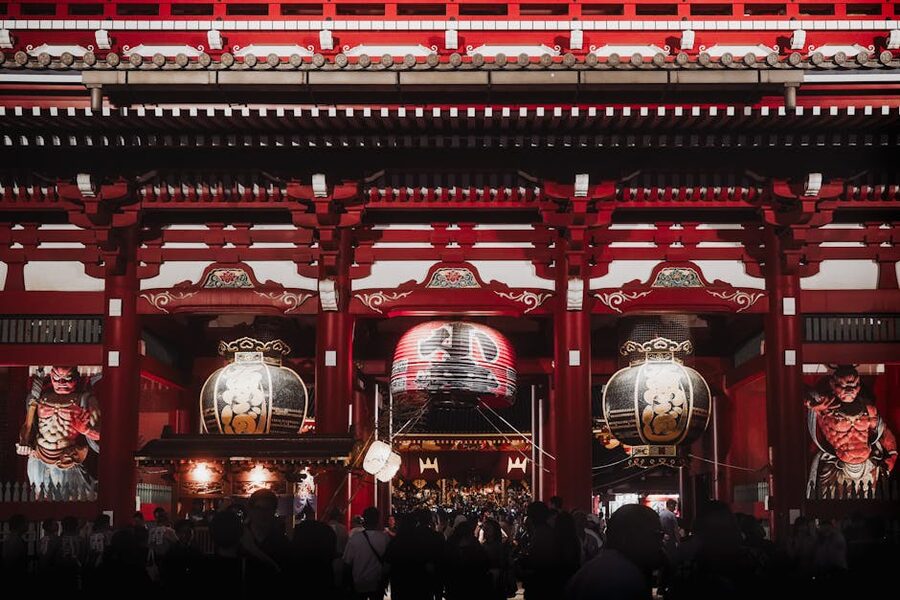 Senso-ji main hall illuminated at night with paper lanterns, Asakusa, Tokyo