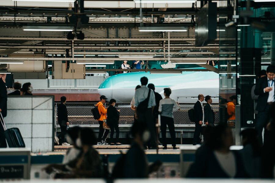 Shinkansen and crowd at a Japanese station platform