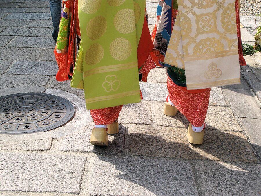 A maiko walking on a Kyoto street