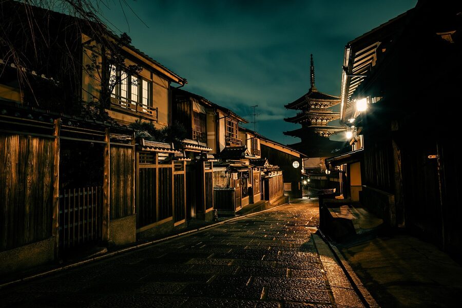 Gion alley with the Yasaka pagoda in the distance at night
