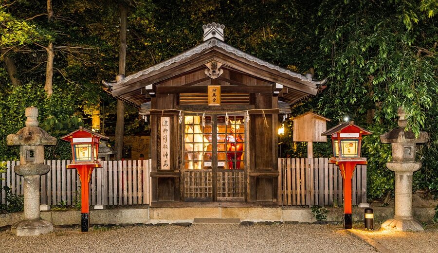 Yasaka Shrine illuminated at night with lanterns