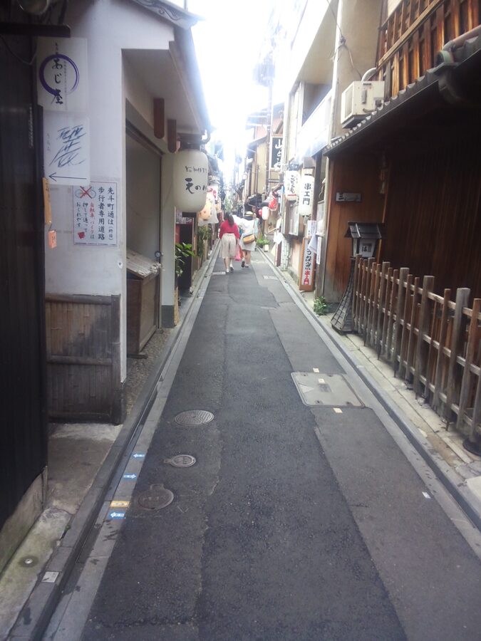 Lantern-lit Pontocho alley with traditional restaurants