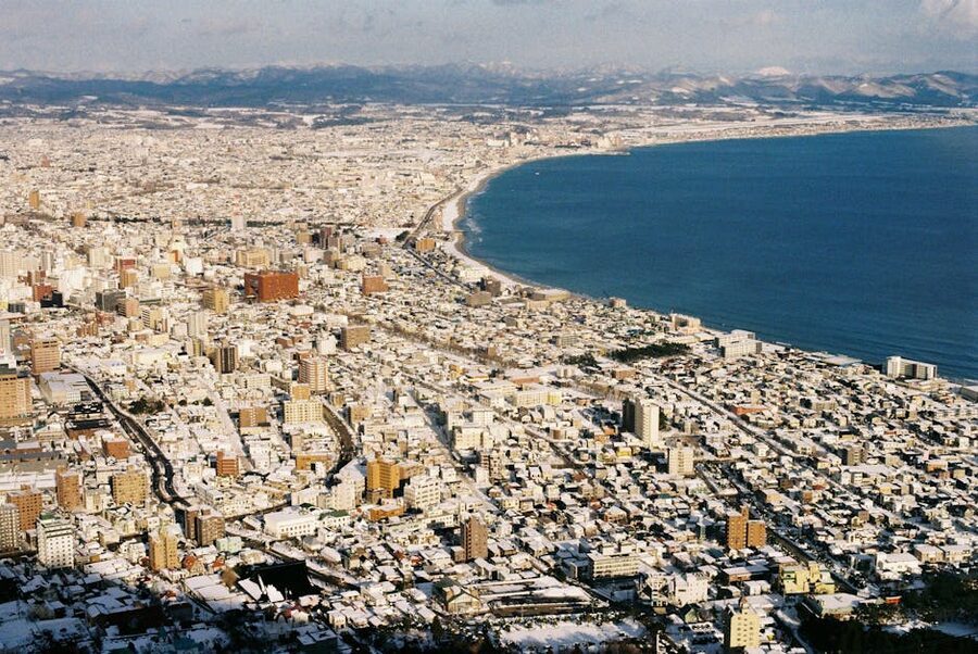 Snow-covered coastal Hakodate aerial
