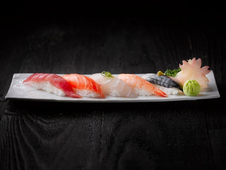 A sushi platter with various nigiri pieces