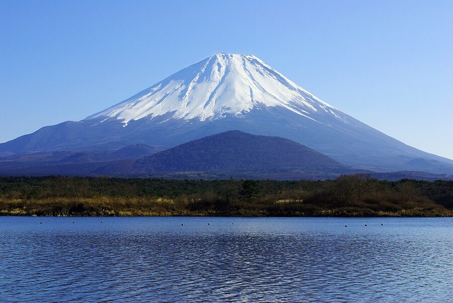 Mt. Fuji rising above the morning mist over Lake Shoji