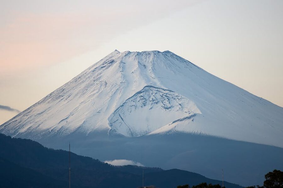 Mt. Fuji in winter from Shizuoka prefecture, snow-covered cone under clear sky