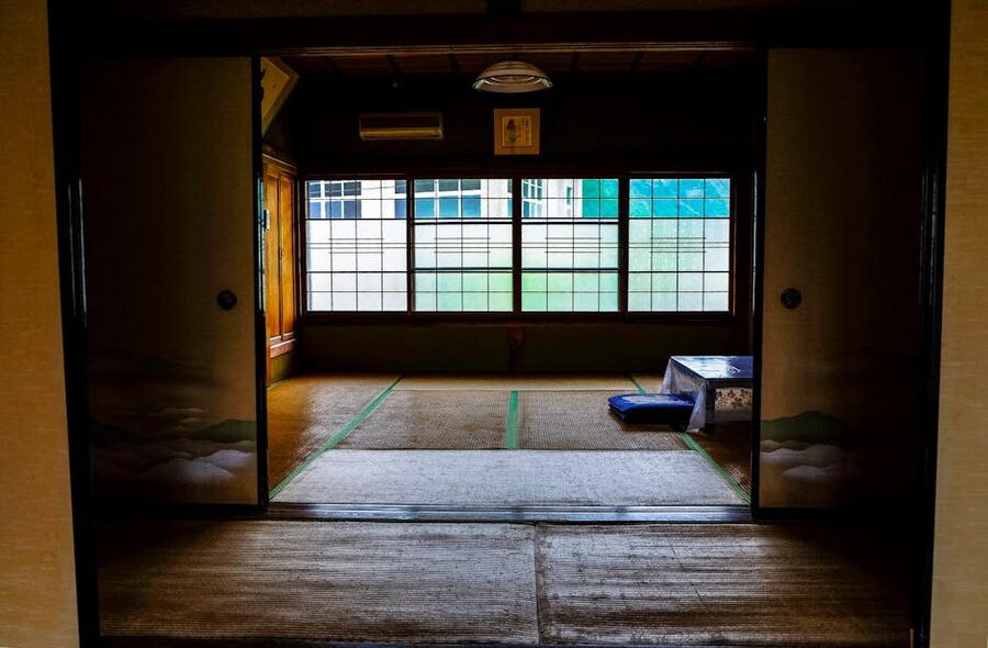 Traditional Japanese ryokan tatami room interior with low table