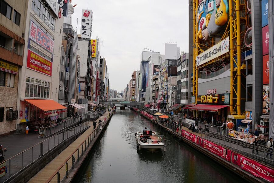 Dotonbori canal at night with neon billboards in Osaka