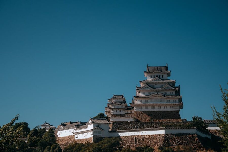 Himeji Castle white keep against blue sky