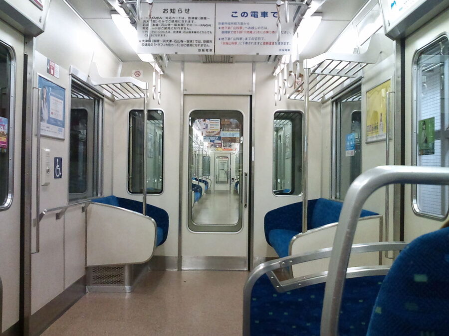 Keihan train at station with passengers