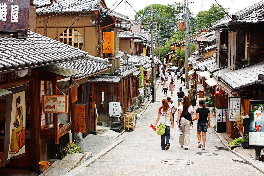 The stone-paved Sannenzaka stairs lined with traditional wooden machiya buildings and lanterns