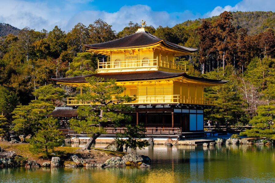 Kinkaku-ji golden pavilion reflected in pond Kyoto