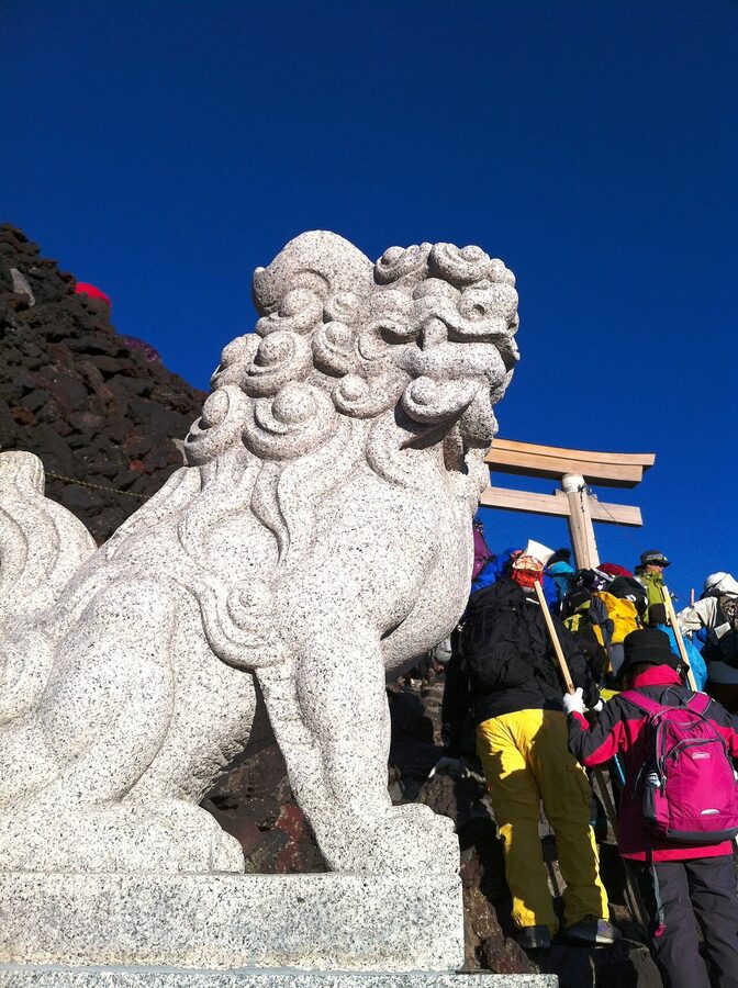 The terrain near the summit on the Yoshida route, with bare volcanic rock and weathered shrines