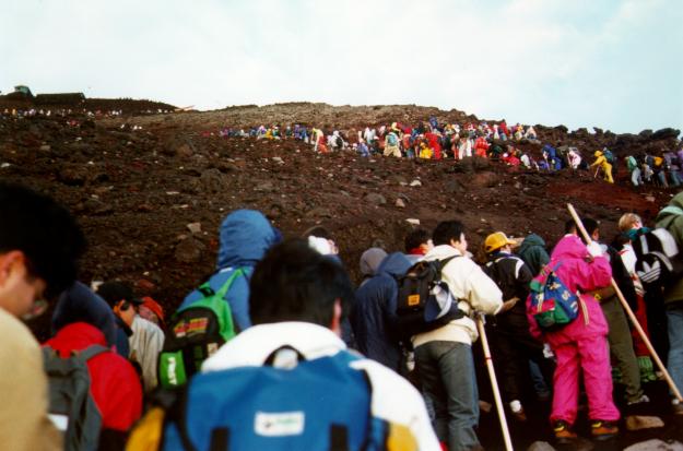 Climbers queueing in the early morning near the Mt Fuji summit