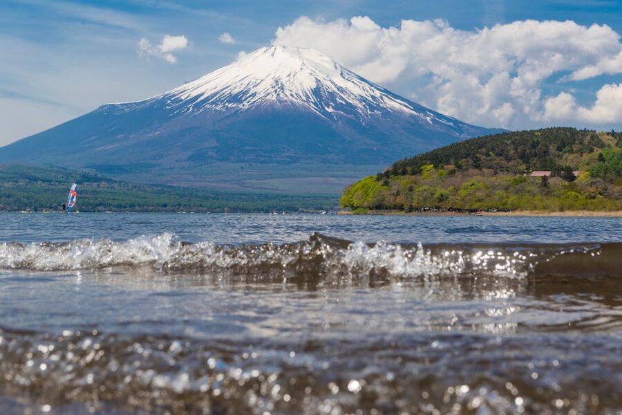 Windsurfers on Lake Yamanaka with Mount Fuji rising in the background