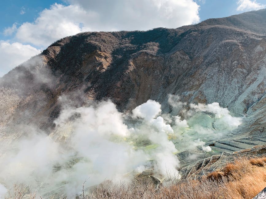 Owakudani volcanic valley in Hakone with steam rising from the rocky terrain
