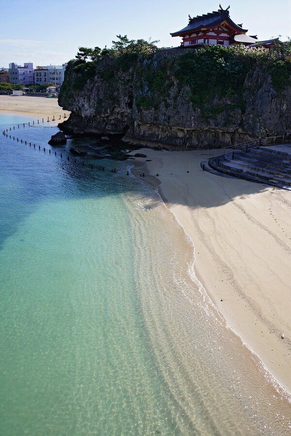 Naminoue Beach with Naminoue Shrine on cliff above