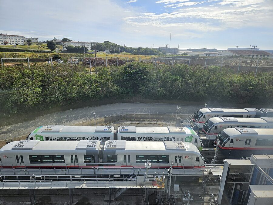 The Yui Rail monorail in Naha, a slim concrete viaduct with a two-car train