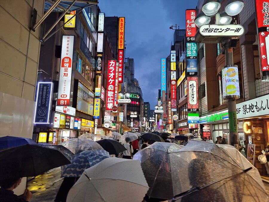 Shibuya Center Gai pedestrian shopping street on a rainy afternoon