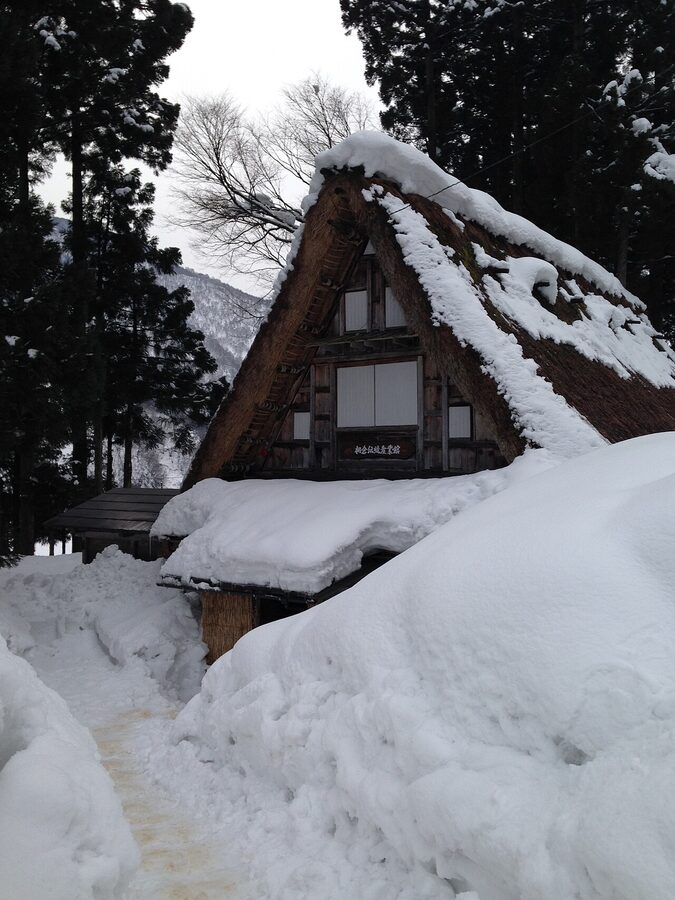 Ainokura Traditional Industry Museum gassho-zukuri building covered in snow in winter