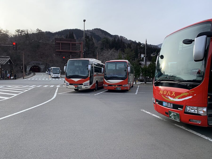 Buses arriving at Shirakawa-go bus terminal in Ogimachi village
