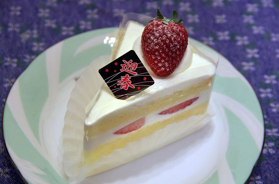 Japanese-style strawberry shortcake with whipped cream and fresh strawberries