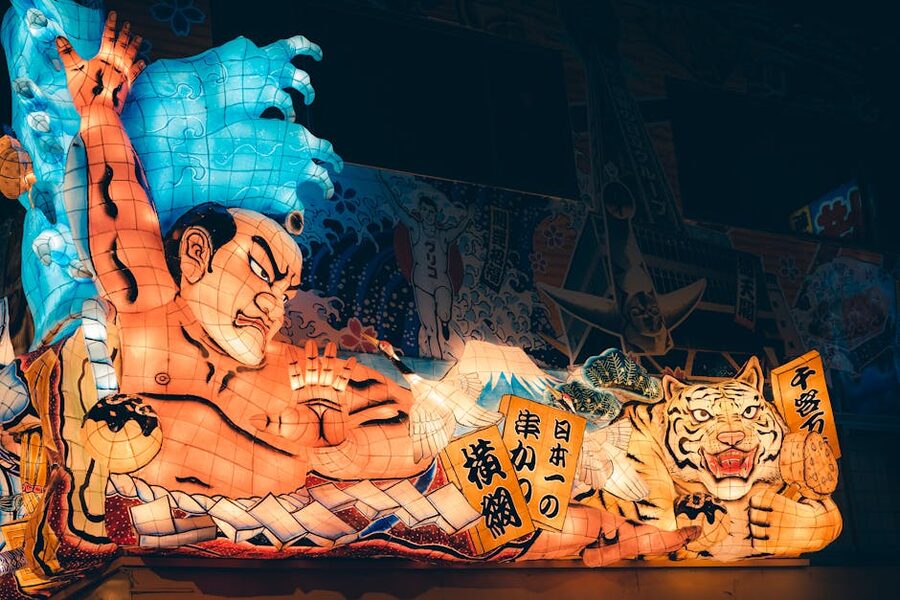 Illuminated Nebuta float lantern of warrior at Aomori festival night parade