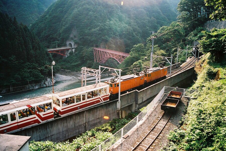 Kurobe Gorge Railway open-sided narrow-gauge train along the canyon