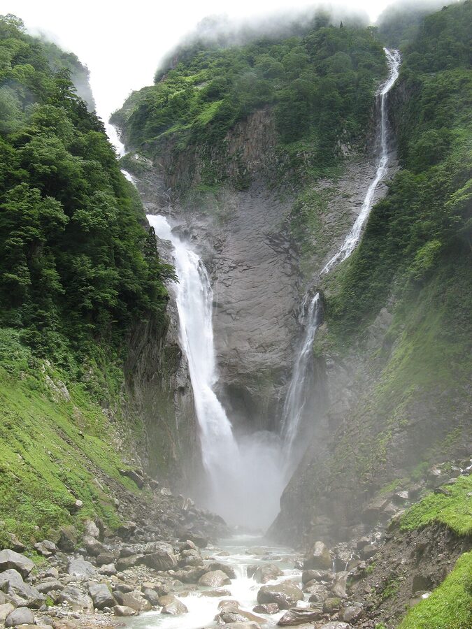 Shomyo Falls in summer flow with waterfall plunging into the basin