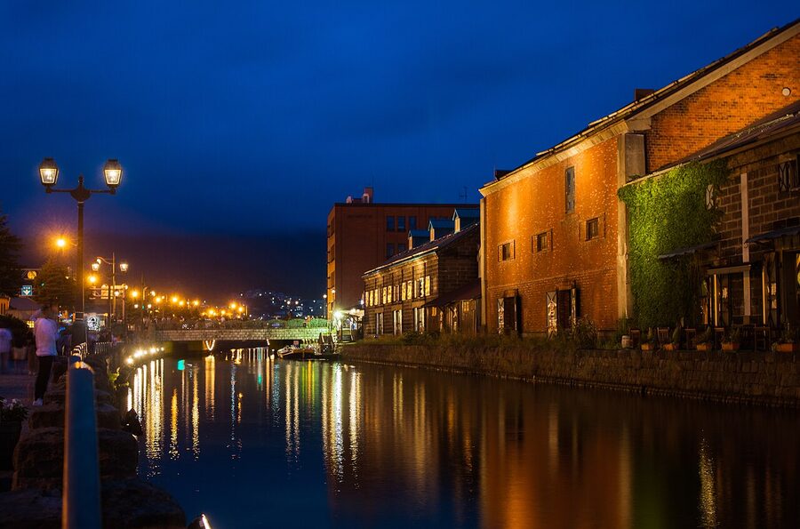 Otaru Canal lined with old stone warehouses on a summer afternoon