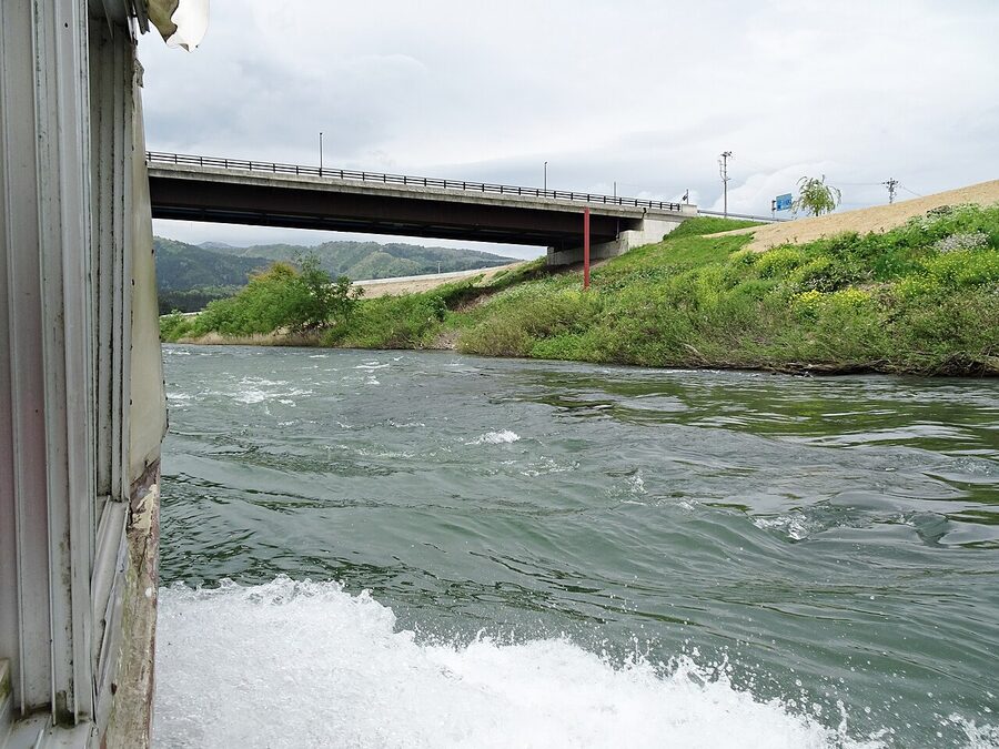 Mogami River boat passing through gorge rapids